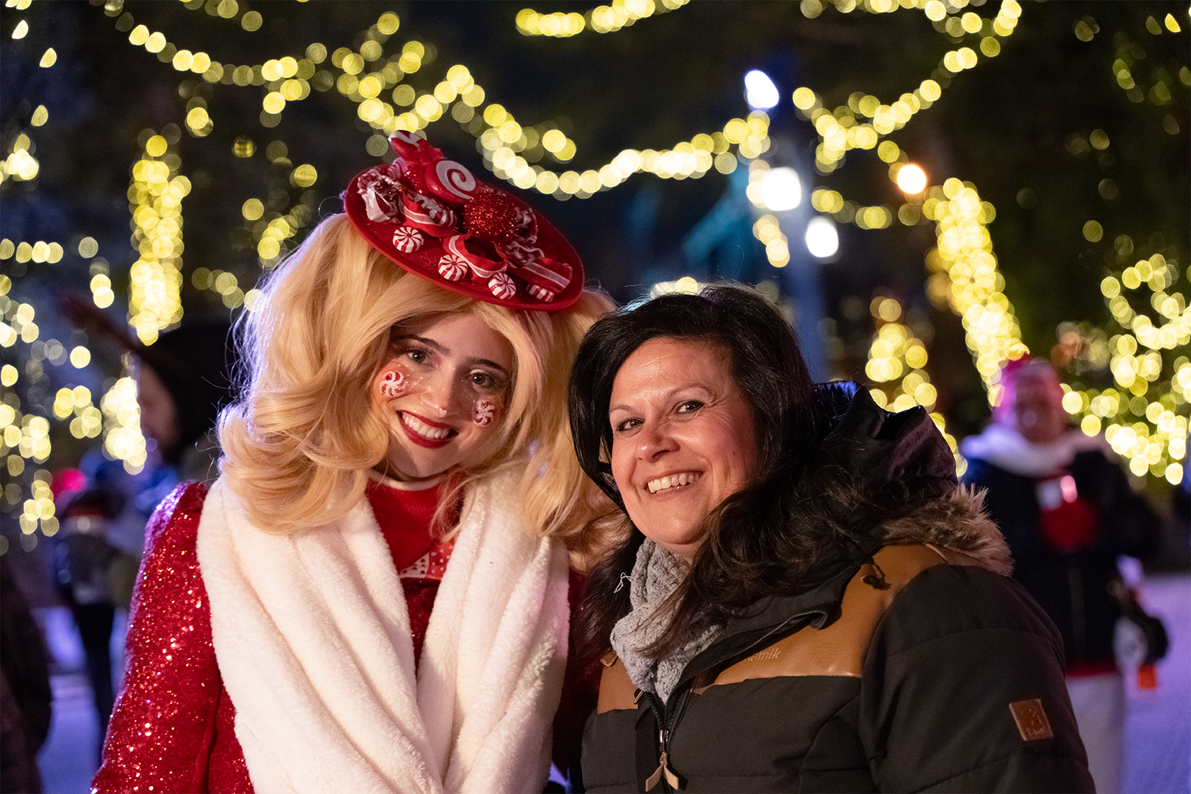 Two women in winter wonderland by Aykas Bhons